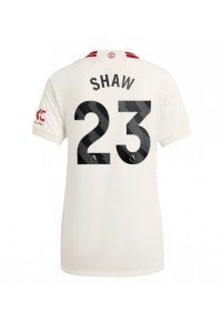 Manchester United Luke Shaw #23 Jalkapallovaatteet Naisten Kolmaspaita 2023-24 Lyhythihainen